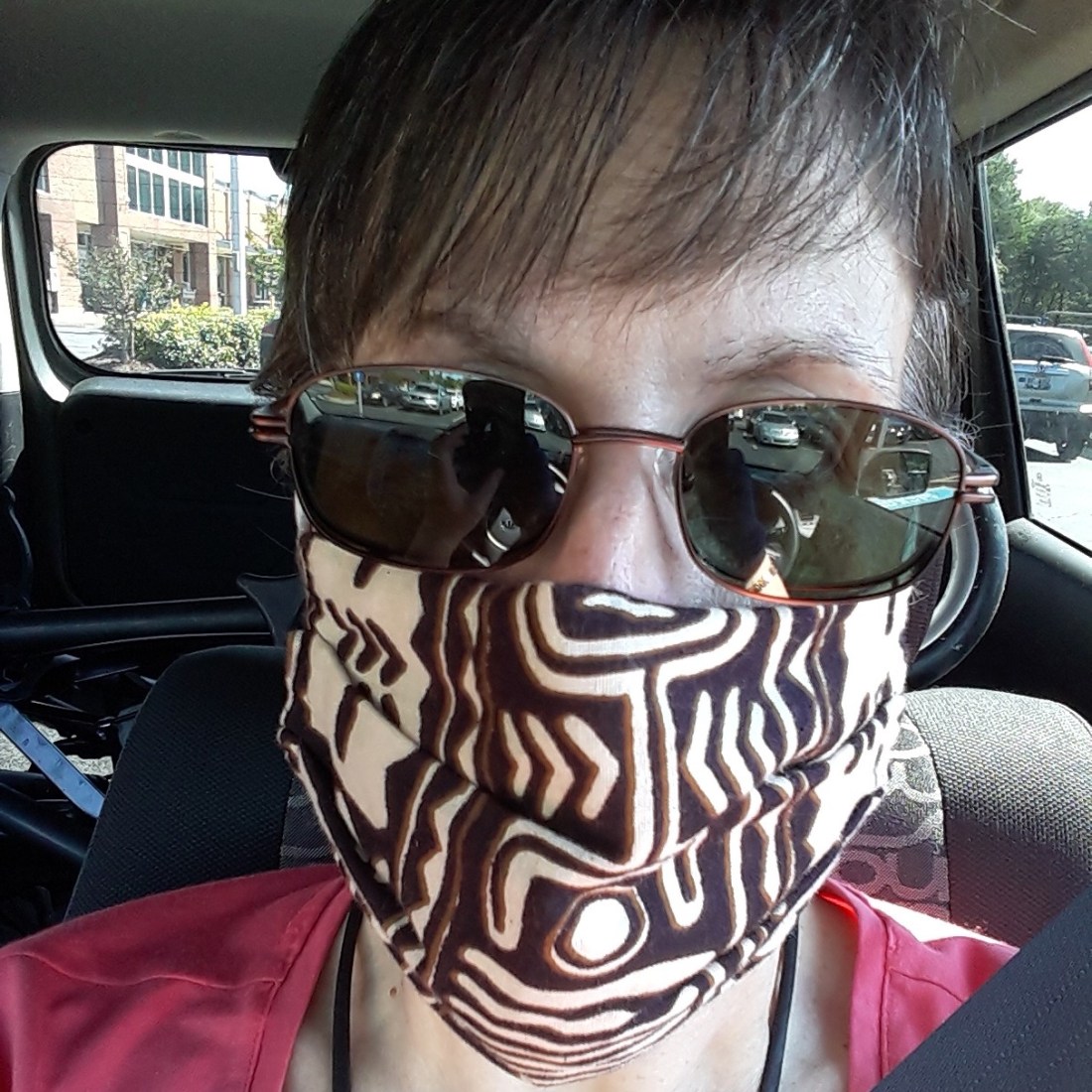 My cloth mask covers my second mask, Parkinson's-generated Resting Bitch Face